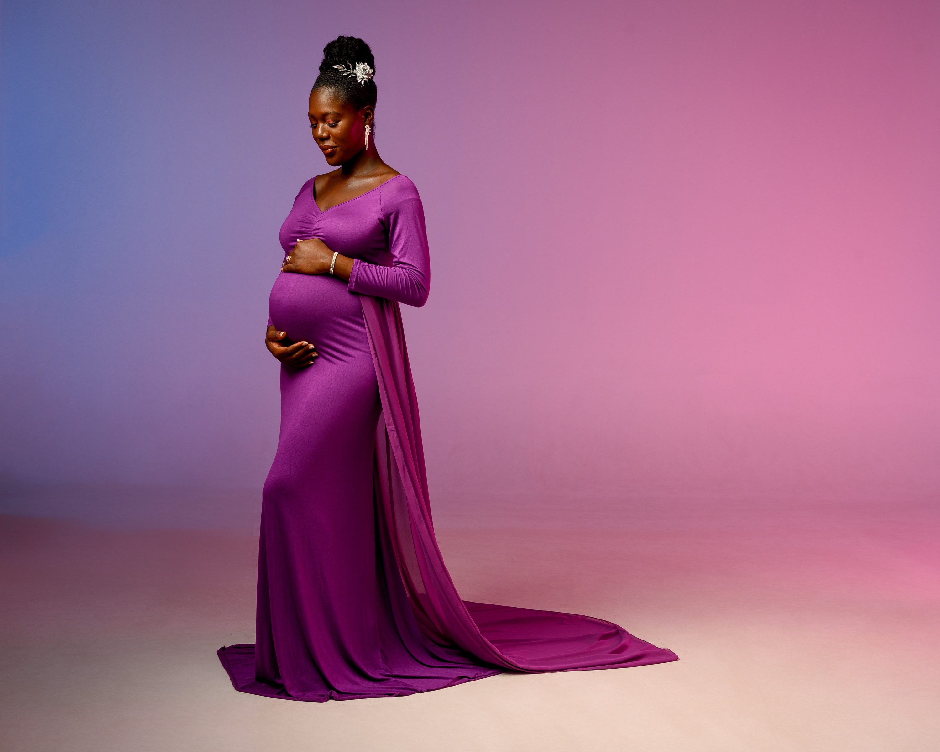 Expectant parent photographed in the studio.